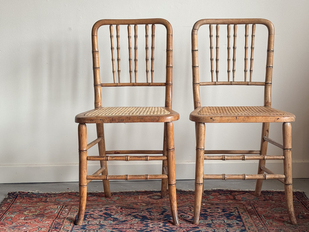 A Pair of Regency Faux Bamboo Chairs