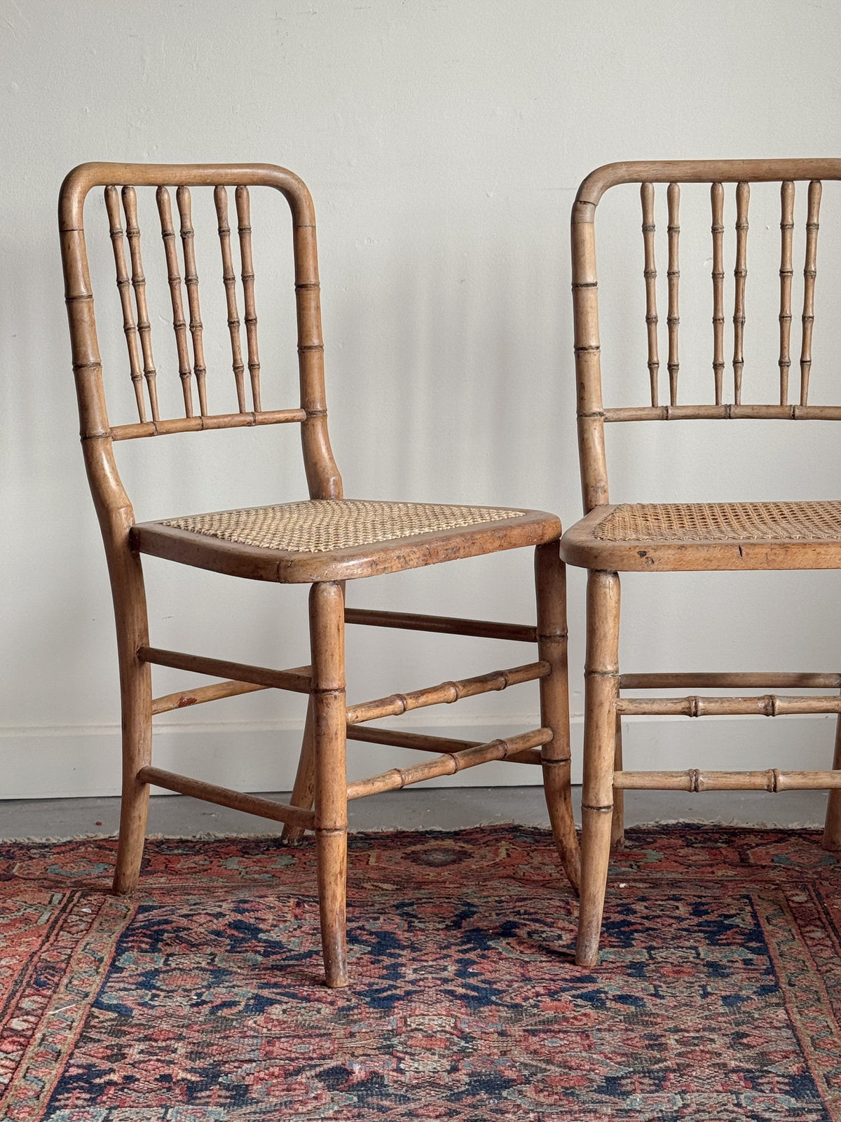 A Pair of Regency Faux Bamboo Chairs
