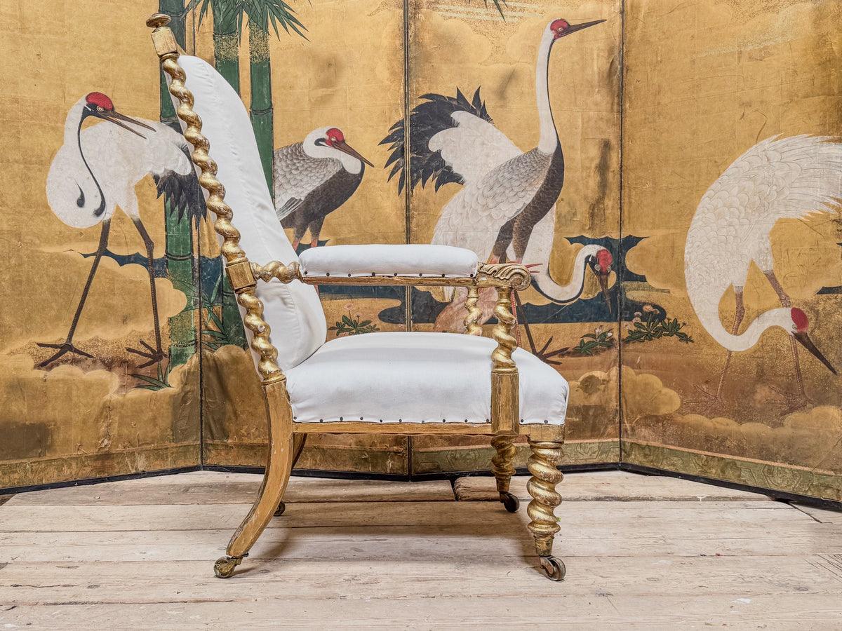 A Mid 19th Century Giltwood Open Armchair