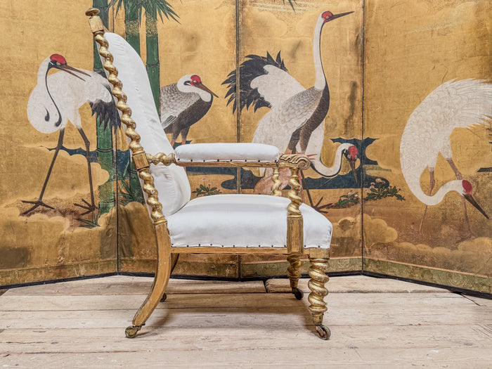 A Mid 19th Century Giltwood Open Armchair