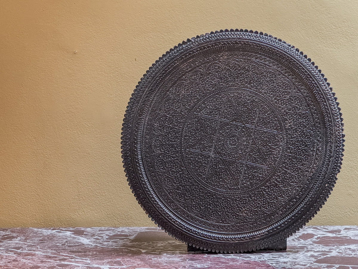 A Mid 19th Century Anglo Indian Ebony Carved Table