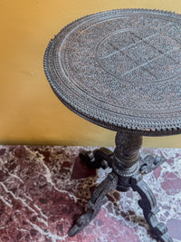 A Mid 19th Century Anglo Indian Ebony Carved Table