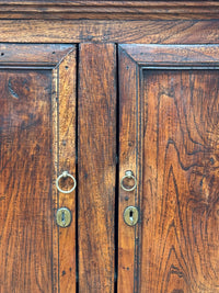 An 18th Century Elm Hanging Cupboard