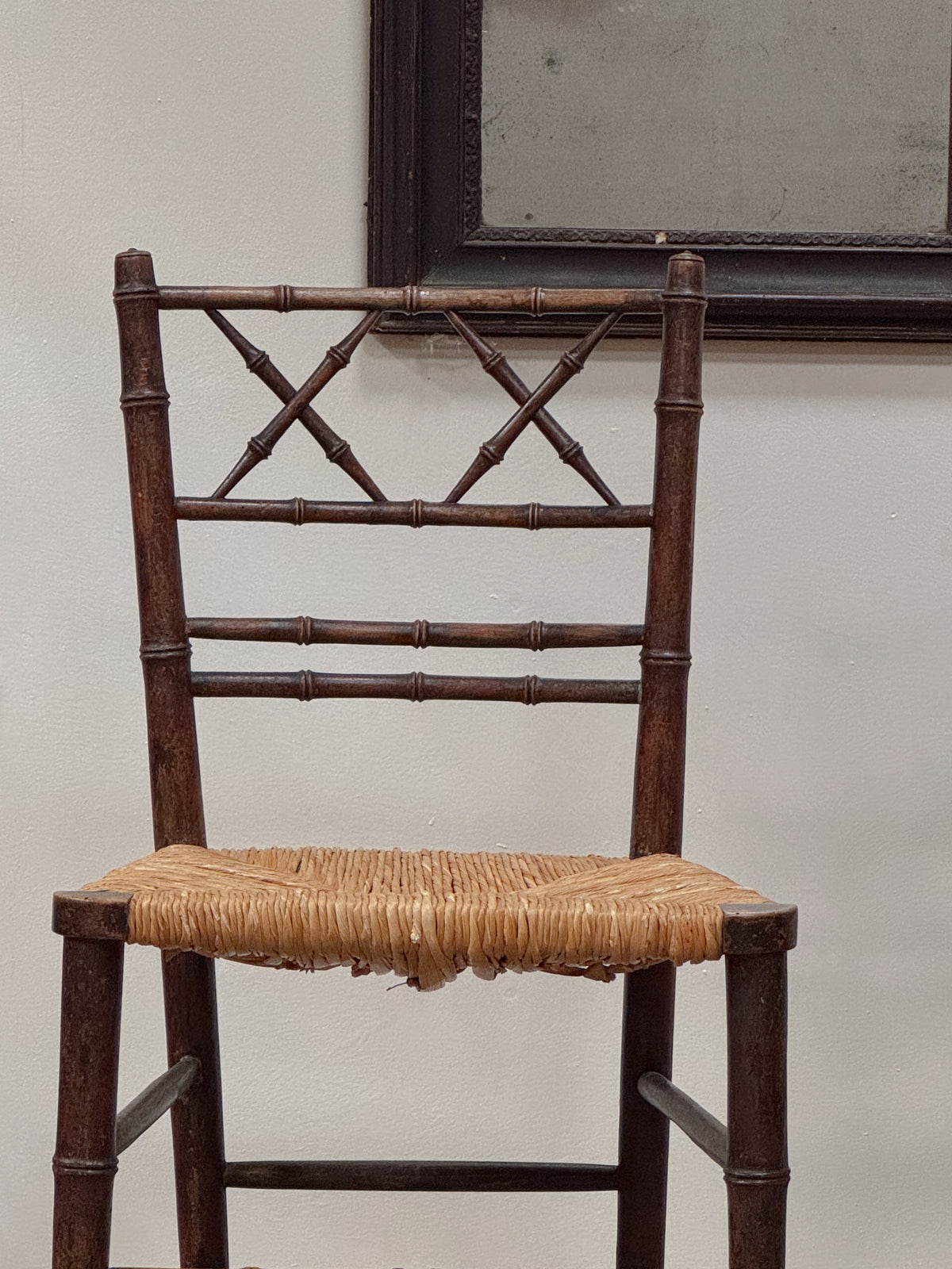 A Pair of Regency Faux Bamboo Rush Seated Chairs