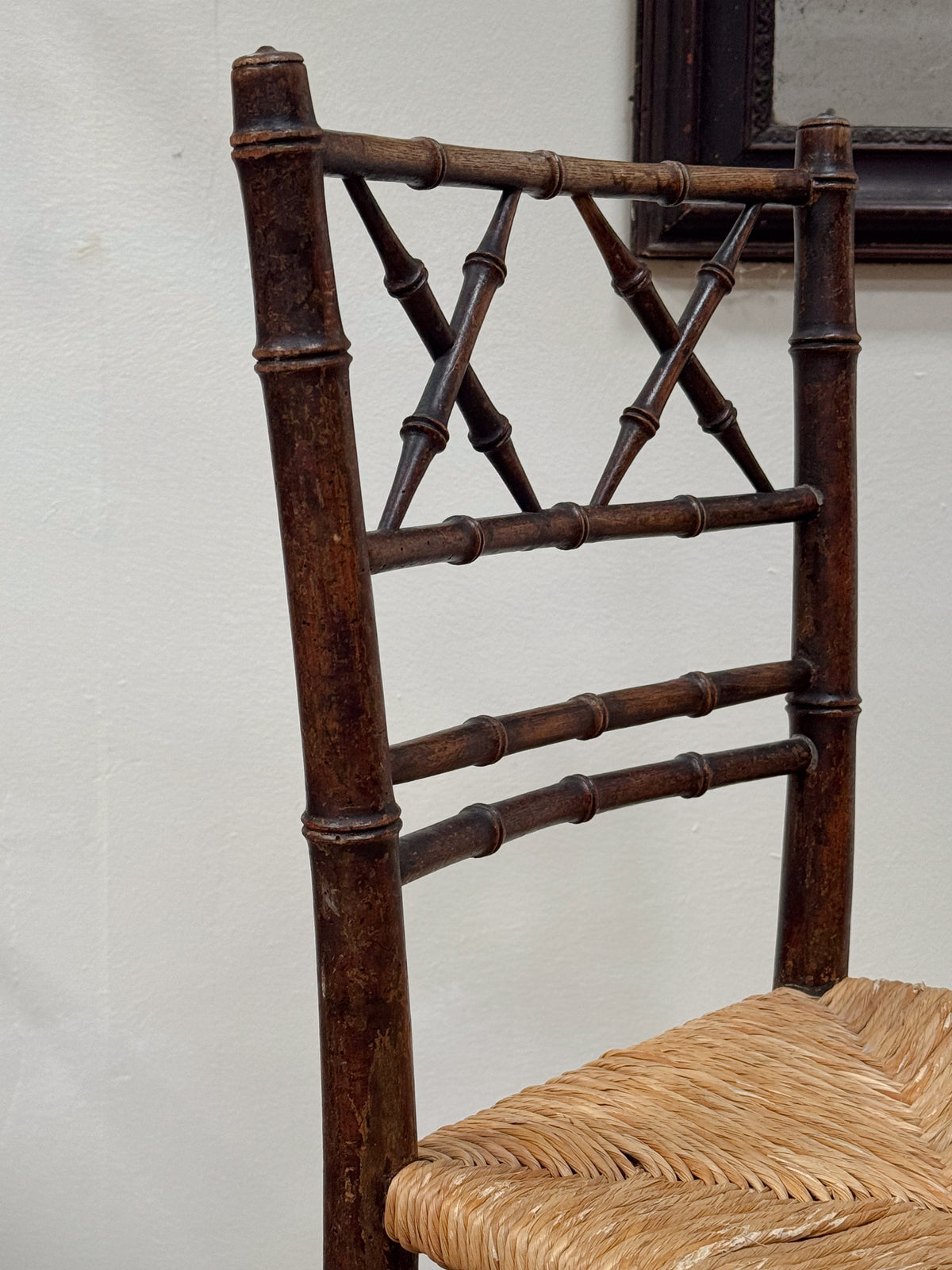 A Pair of Regency Faux Bamboo Rush Seated Chairs