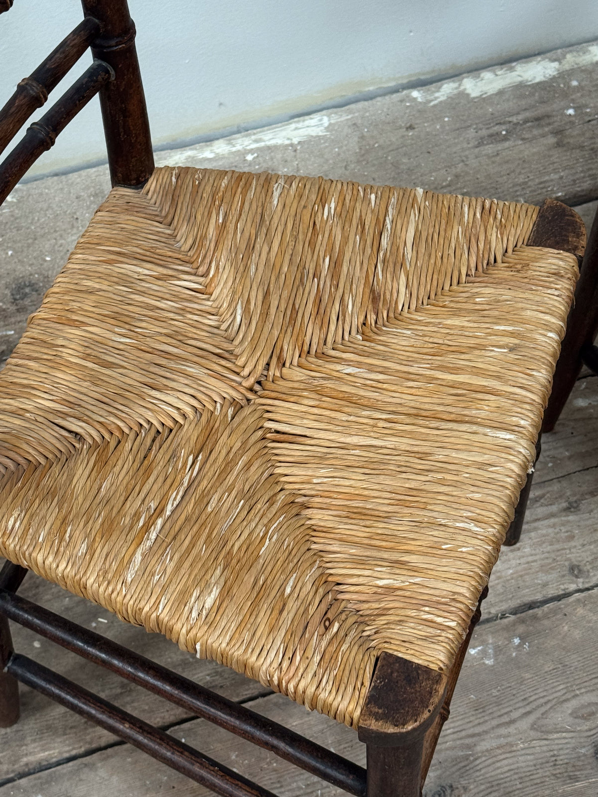 A Pair of Regency Faux Bamboo Rush Seated Chairs