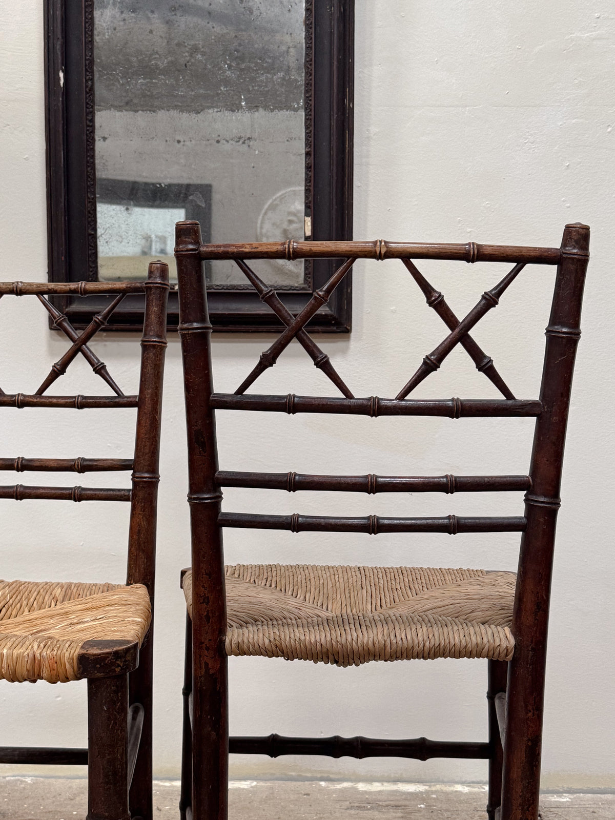 A Pair of Regency Faux Bamboo Rush Seated Chairs