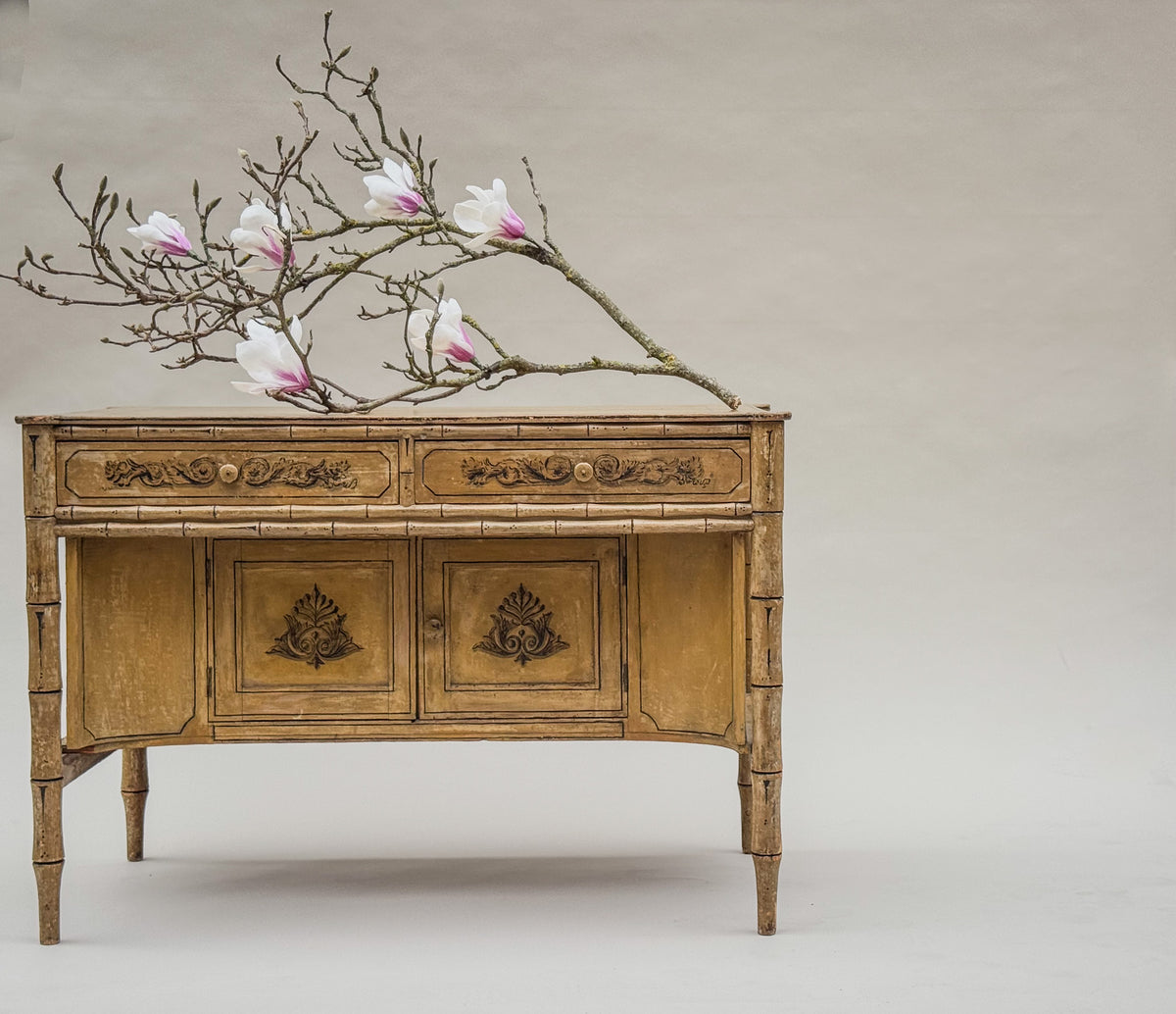 A Late Regency Faux Bamboo Painted Cabinet