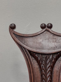 A Pair of Regency Mahogany 'Pelta' Back Hall Chairs in the manner of Gillows