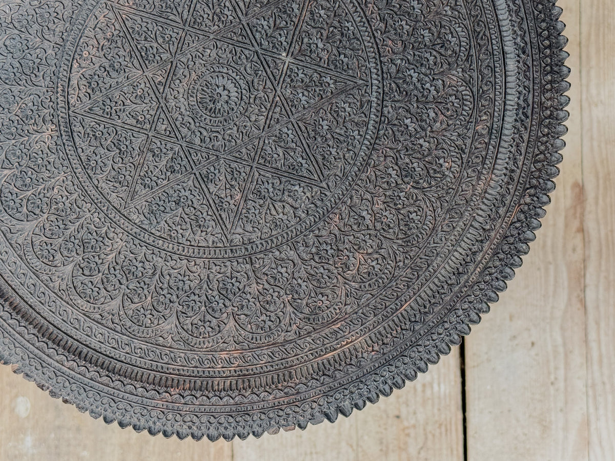 A Mid 19th Century Anglo Indian Ebony Carved Table