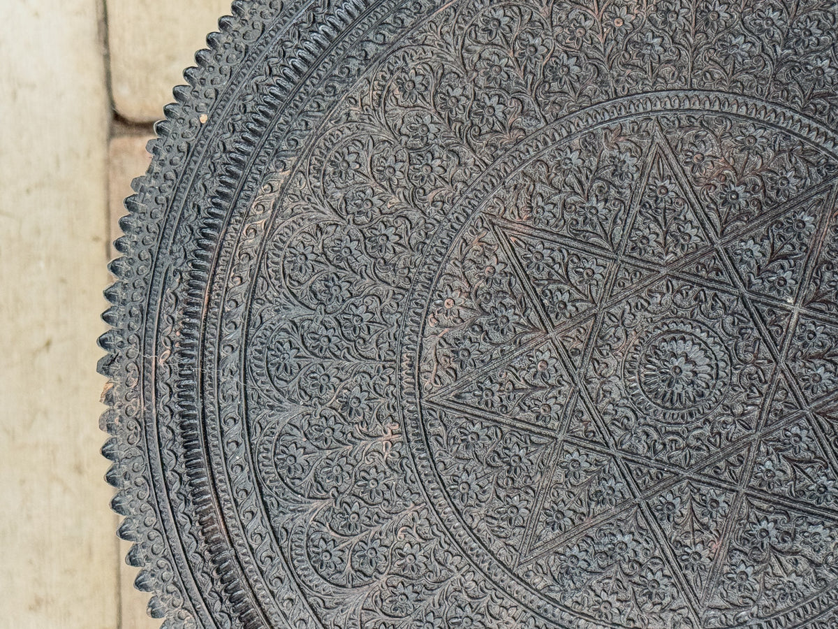 A Mid 19th Century Anglo Indian Ebony Carved Table
