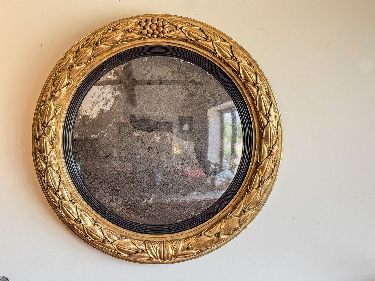 A Regency Giltwood Convex Mirror