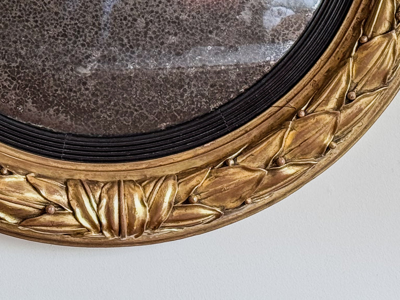 A Regency Giltwood Convex Mirror