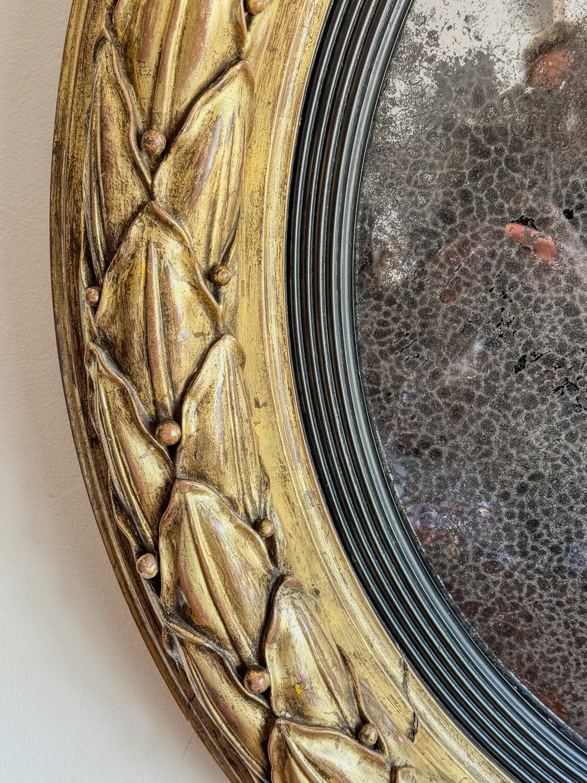 A Regency Giltwood Convex Mirror