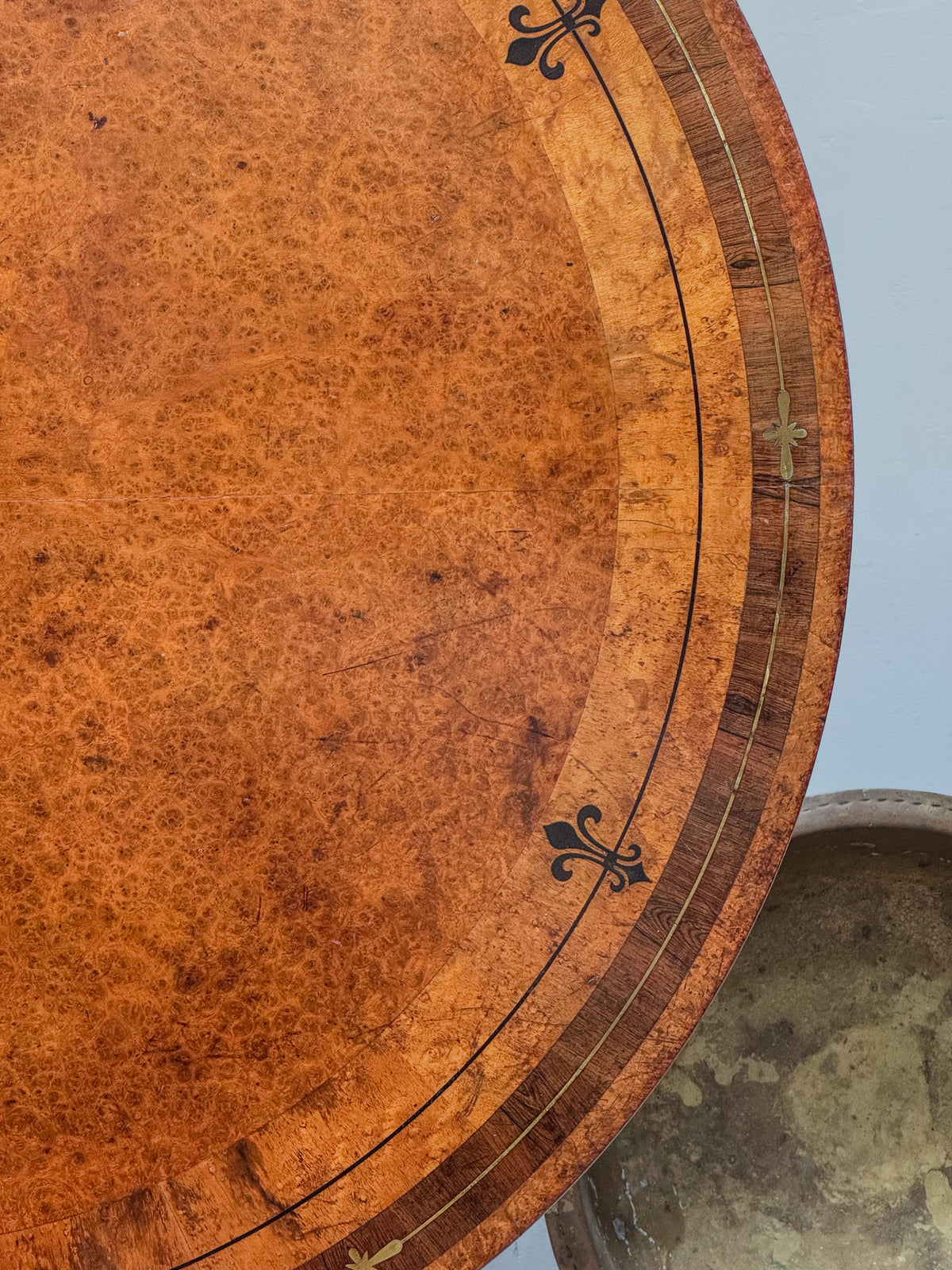 A Regency Amboyna Centre Table in the manner of George Oakley (1760-1840)