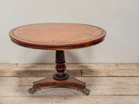 A Regency Amboyna Centre Table in the manner of George Oakley (1760-1840)