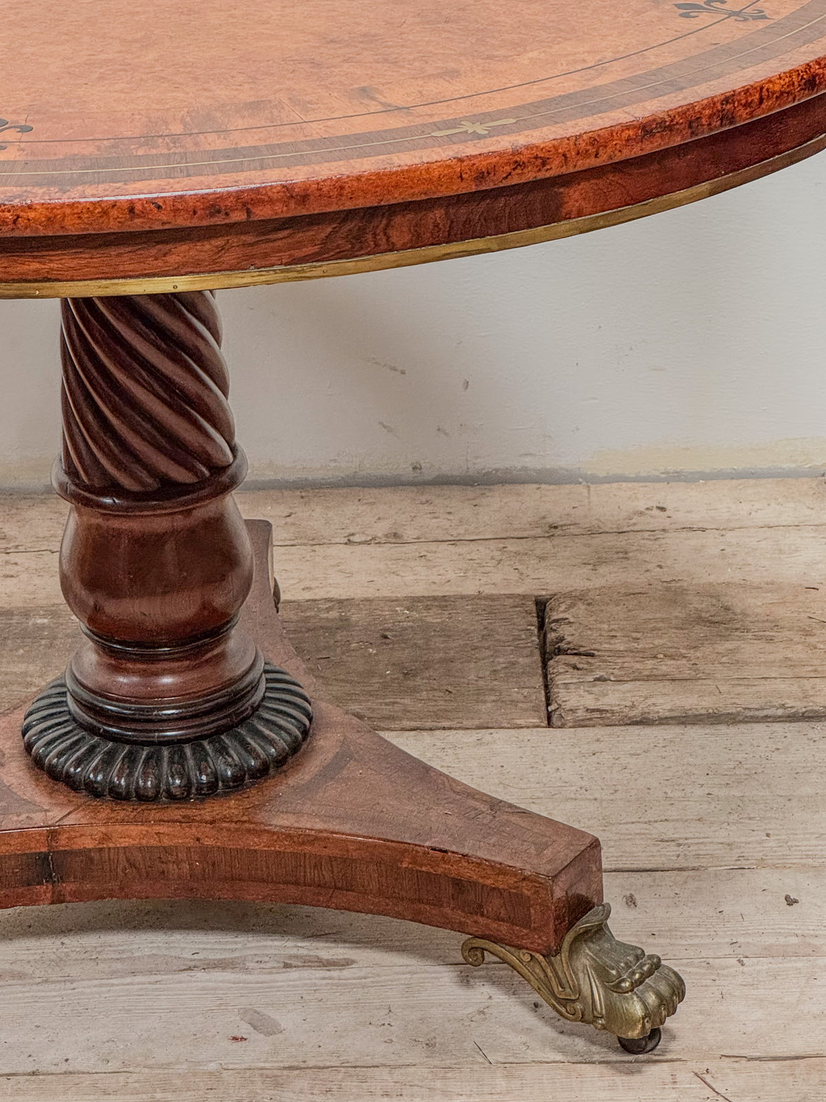 A Regency Amboyna Centre Table in the manner of George Oakley (1760-1840)