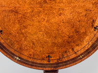 A Regency Amboyna Centre Table in the manner of George Oakley (1760-1840)