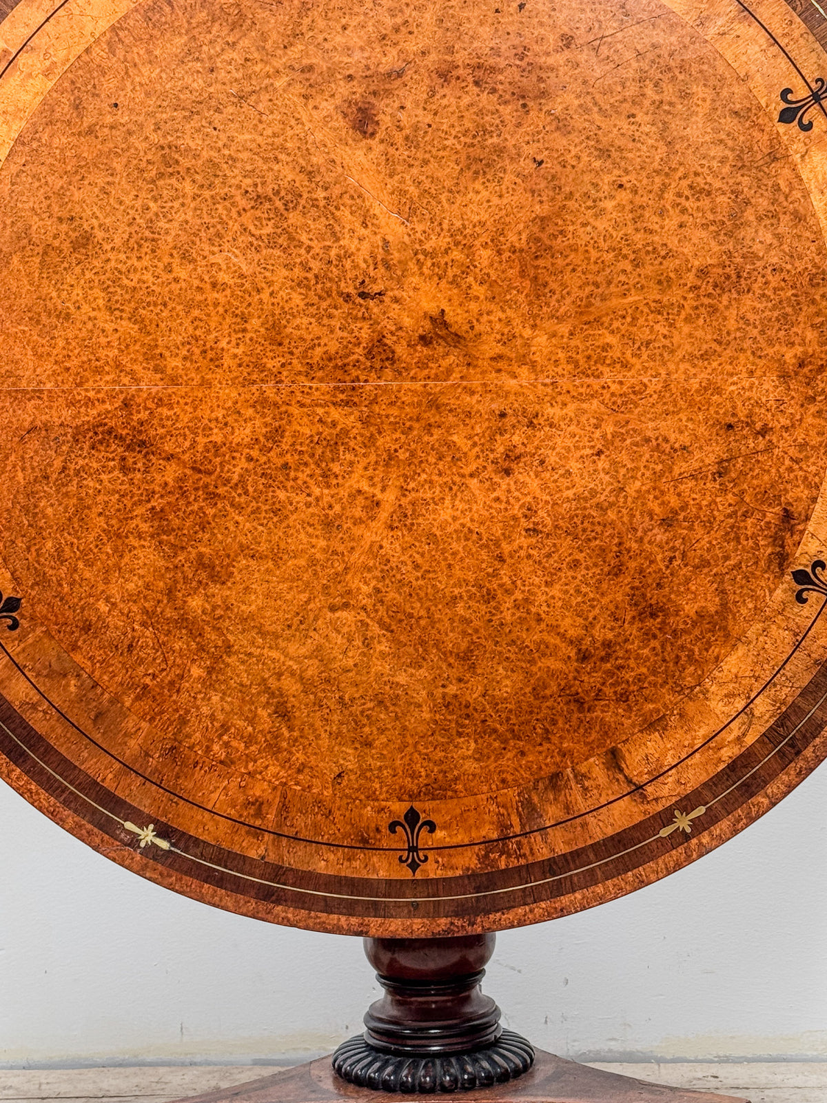A Regency Amboyna Centre Table in the manner of George Oakley (1760-1840)