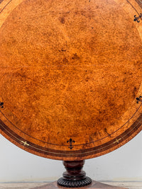 A Regency Amboyna Centre Table in the manner of George Oakley (1760-1840)