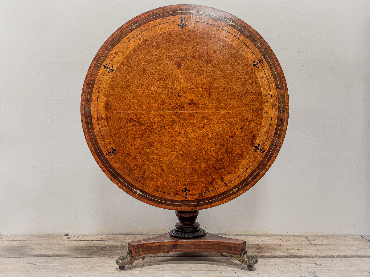 A Regency Amboyna Centre Table in the manner of George Oakley (1760-1840)