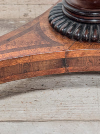 A Regency Amboyna Centre Table in the manner of George Oakley (1760-1840)