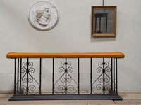 An Early 20th Century Wrought Iron Club Fender