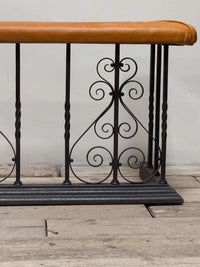 An Early 20th Century Wrought Iron Club Fender