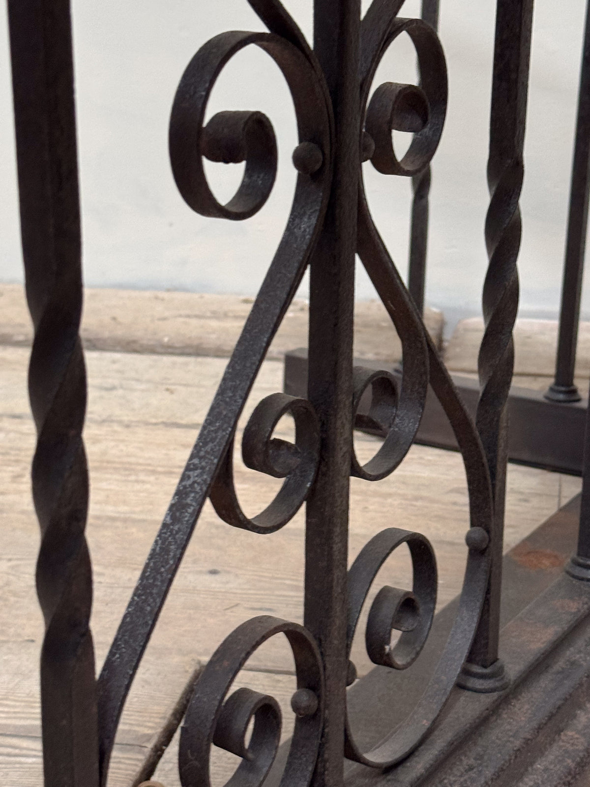 An Early 20th Century Wrought Iron Club Fender