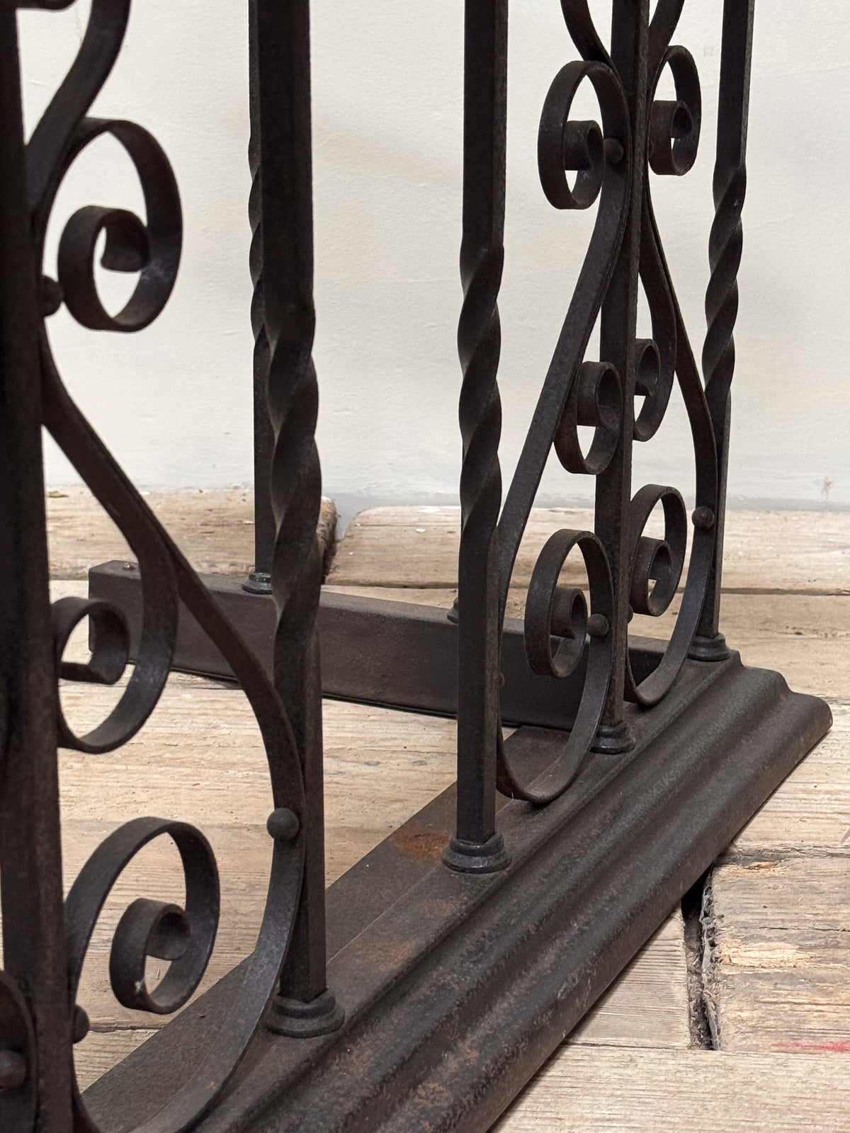 An Early 20th Century Wrought Iron Club Fender