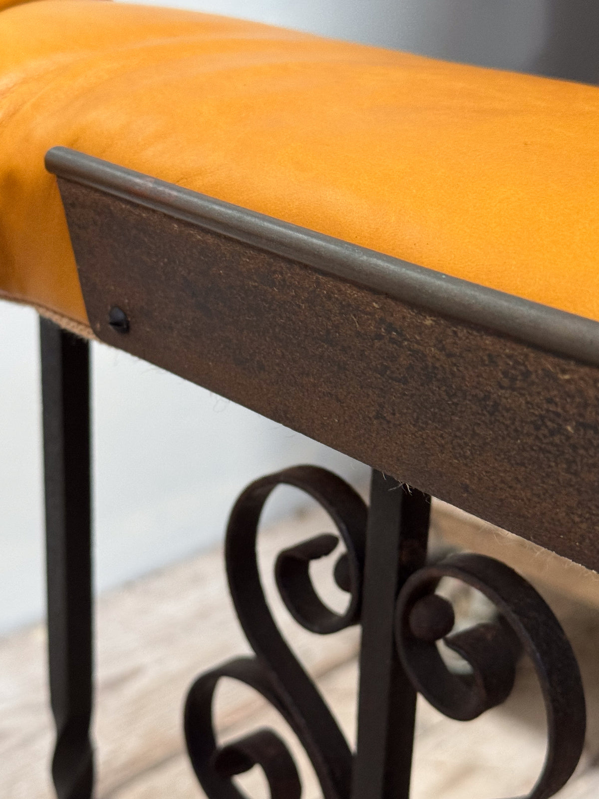 An Early 20th Century Wrought Iron Club Fender