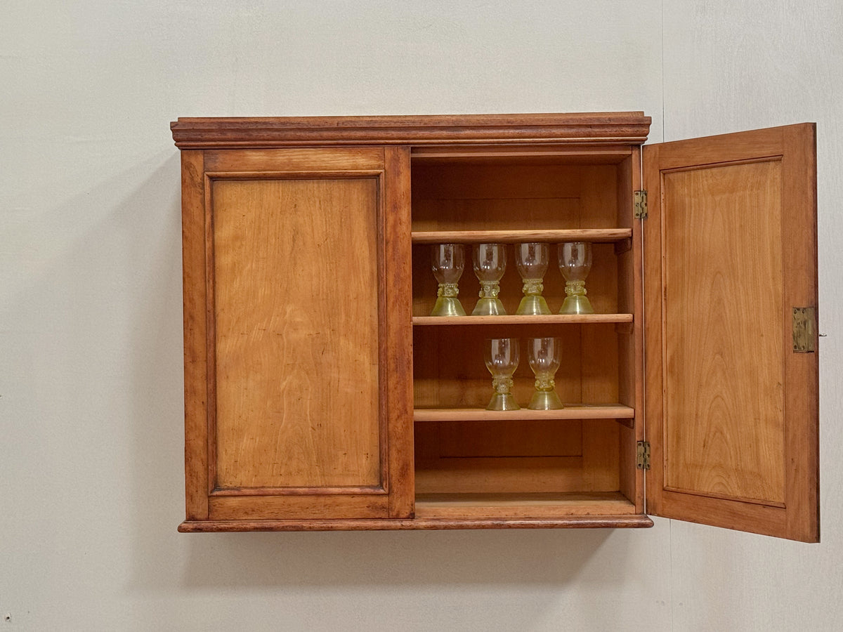 A Mid 19th Century Satinwood Cupboard by C.Hindley & Sons