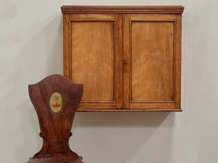 A Mid 19th Century Satinwood Cupboard by C.Hindley & Sons