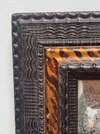 An Early 18th Century Dutch Ebony & Faux Tortoiseshell Ripple Frame Mirror