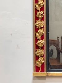 An Early 20th Century French Gilt and Red Velvet Mirror