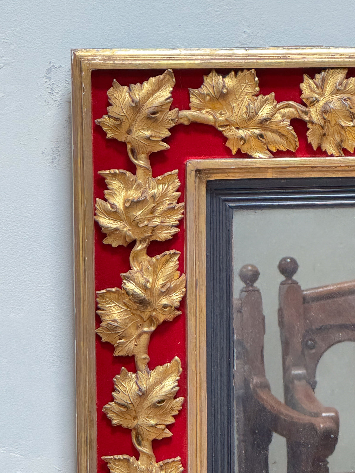 An Early 20th Century French Gilt and Red Velvet Mirror