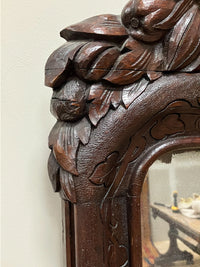 A Large Late 19th Century Black Forest Mirror