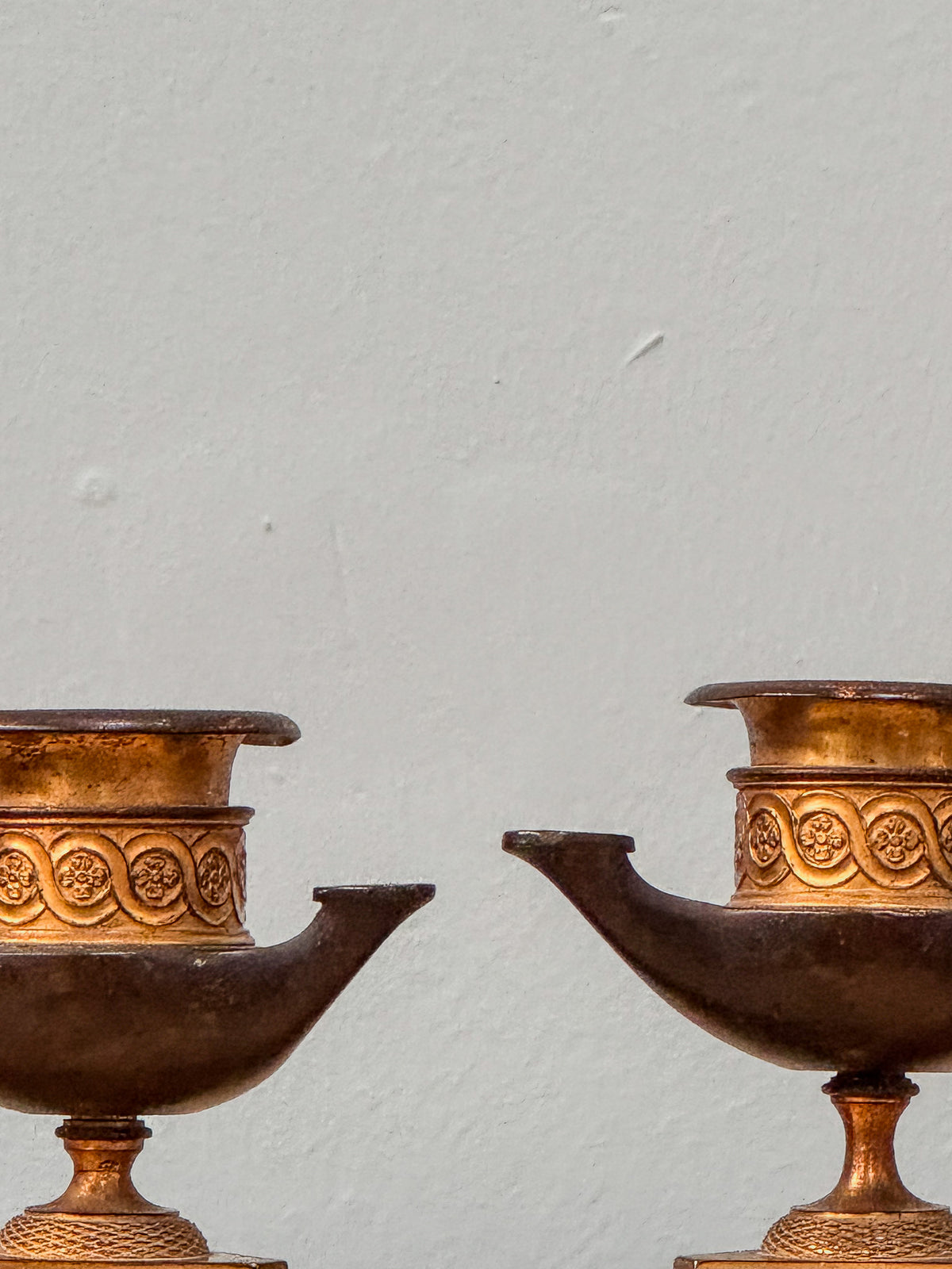 A Pair of Regency Ormolu and Bronze Candlesticks after George Smith (1756-1826)