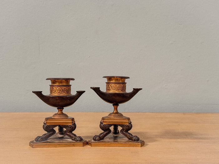 A Pair of Regency Ormolu and Bronze Candlesticks after George Smith (1756-1826)