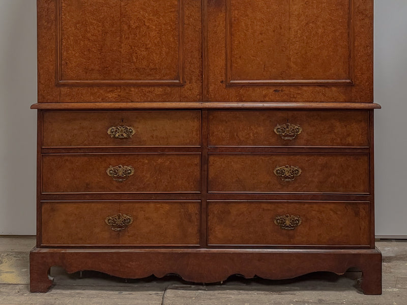 A George III Pollard Oak Cupboard