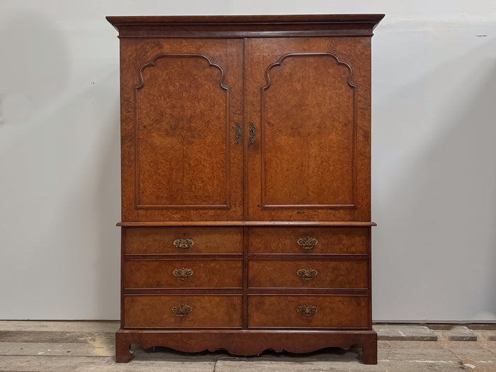 A George III Pollard Oak Cupboard