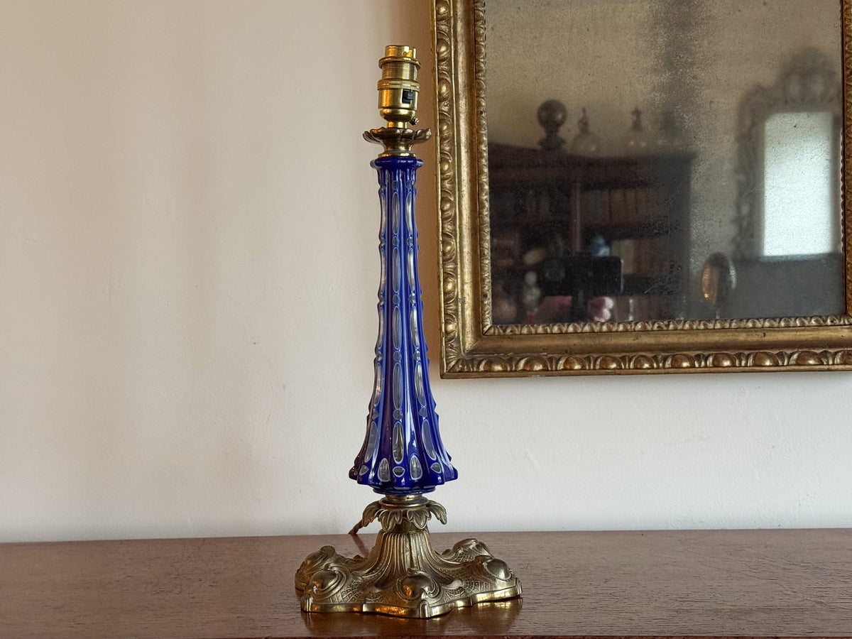 A Mid 19th Century Blue Glass and Brass Lamp