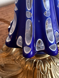 A Mid 19th Century Blue Glass and Brass Lamp