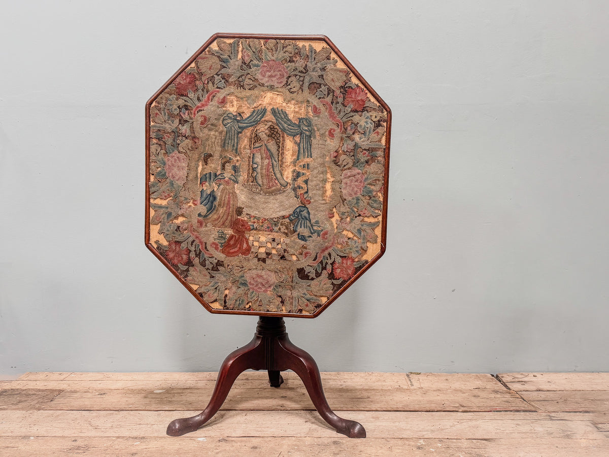 A George III Mahogany Table with Needlepoint