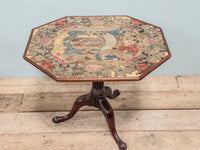 A George III Mahogany Table with Needlepoint