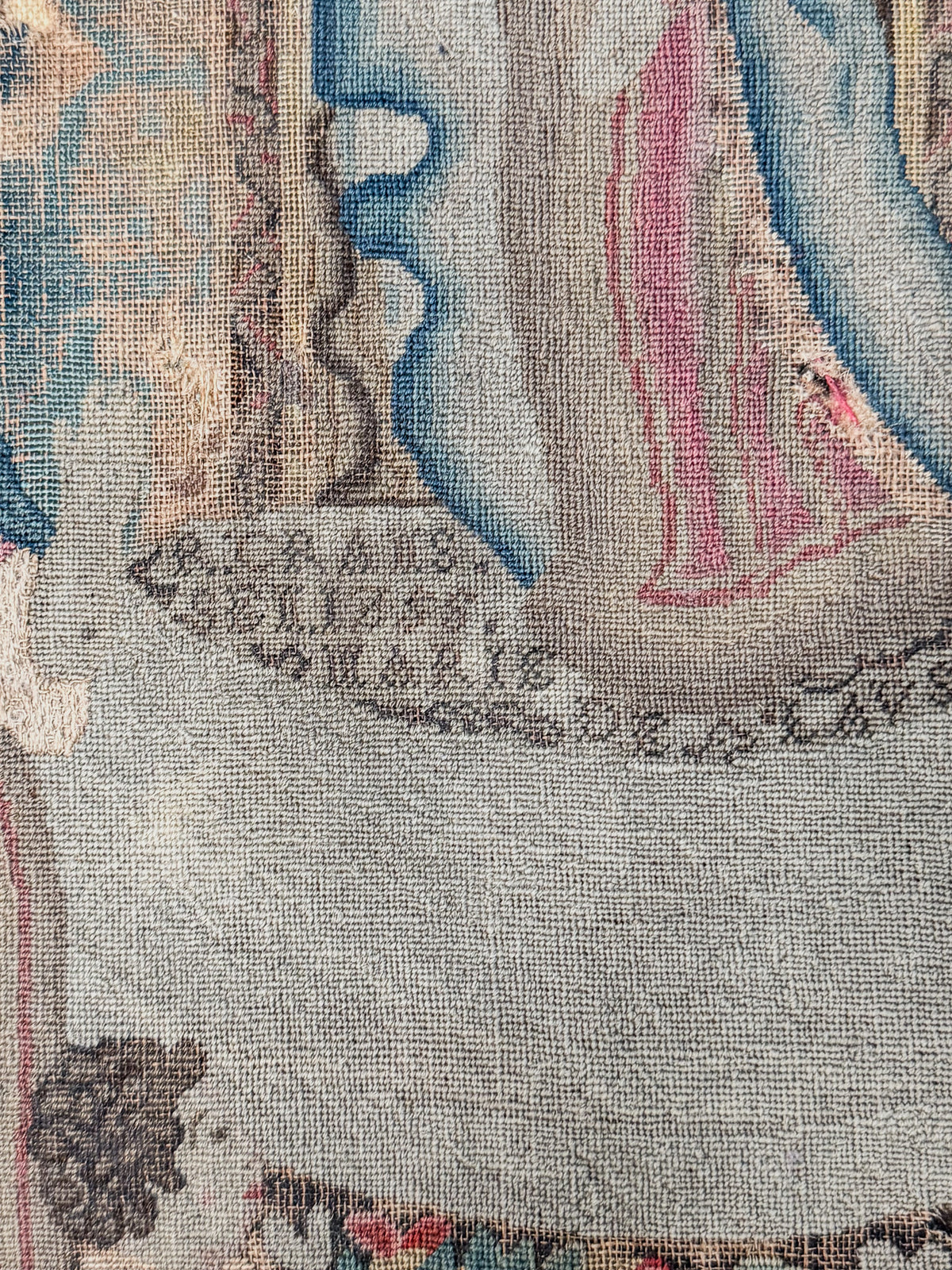 A George III Mahogany Table with Needlepoint