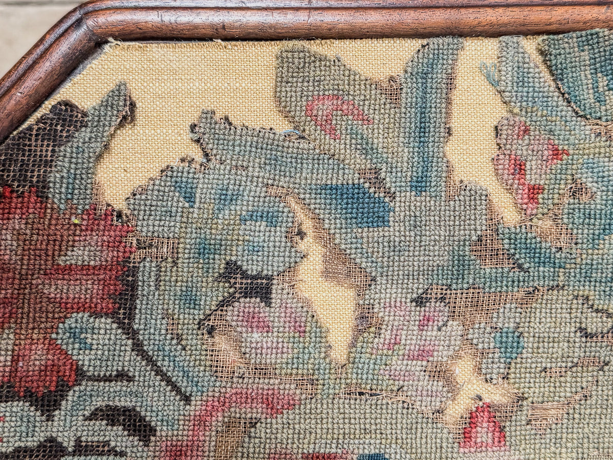 A George III Mahogany Table with Needlepoint