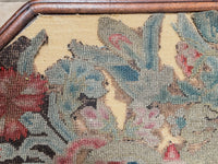 A George III Mahogany Table with Needlepoint