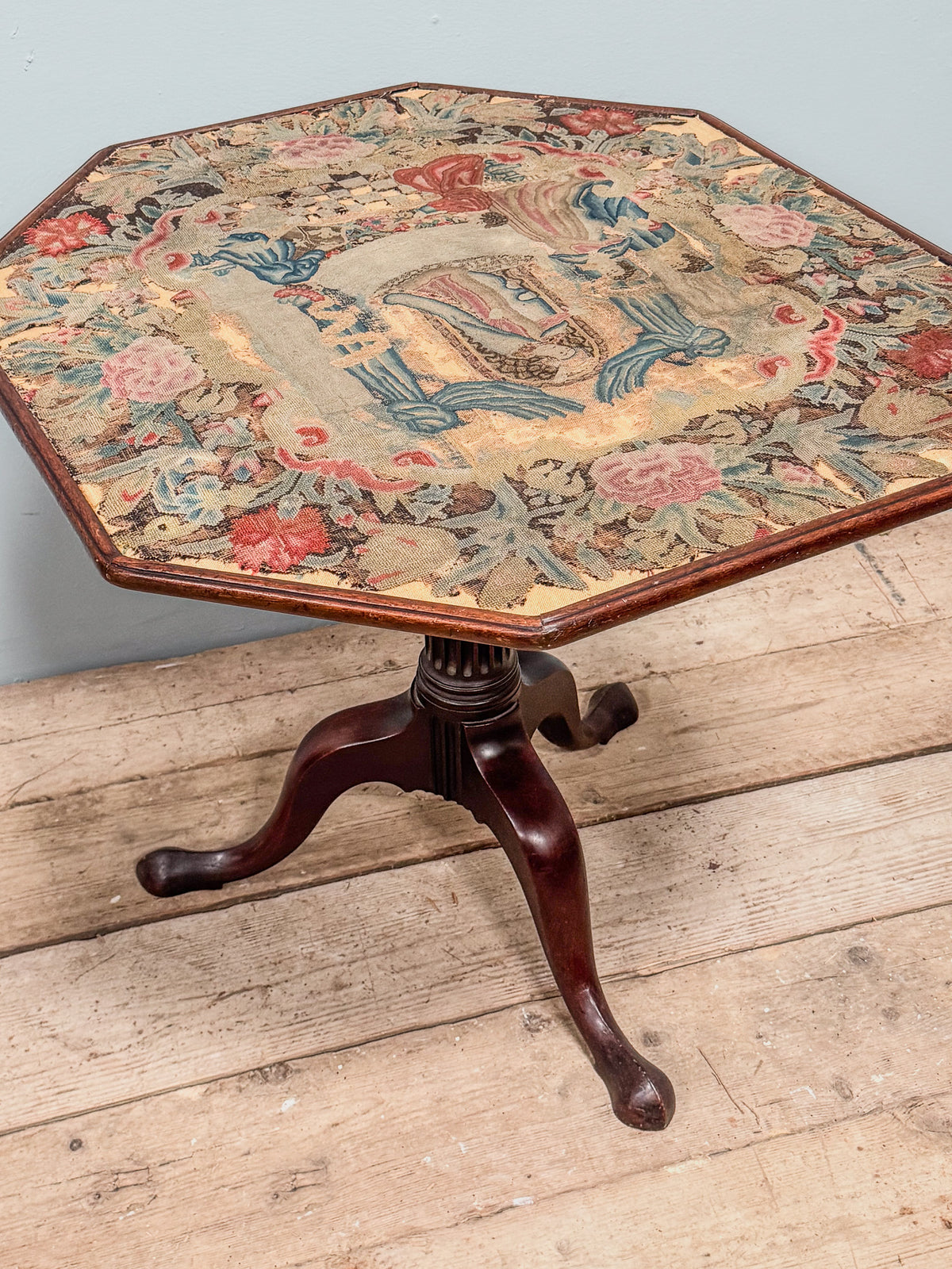 A George III Mahogany Table with Needlepoint