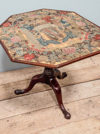 A George III Mahogany Table with Needlepoint